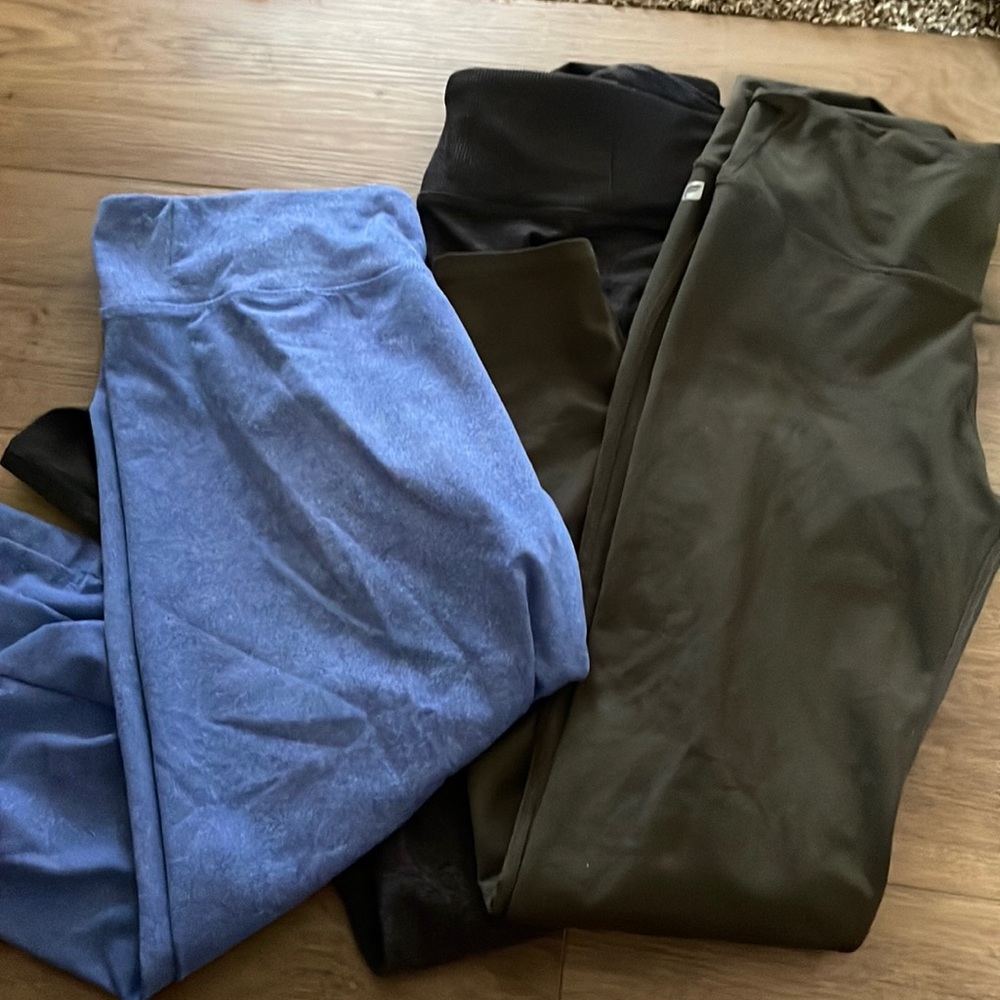 Leggings size small - colors are grey, blue and olive green. Perfect condition